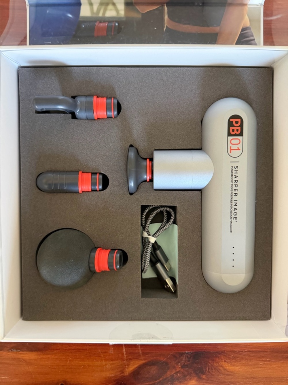 PB01 Sharper Image Powerboost MovePortable Massage Gun - Silver with Red Accents